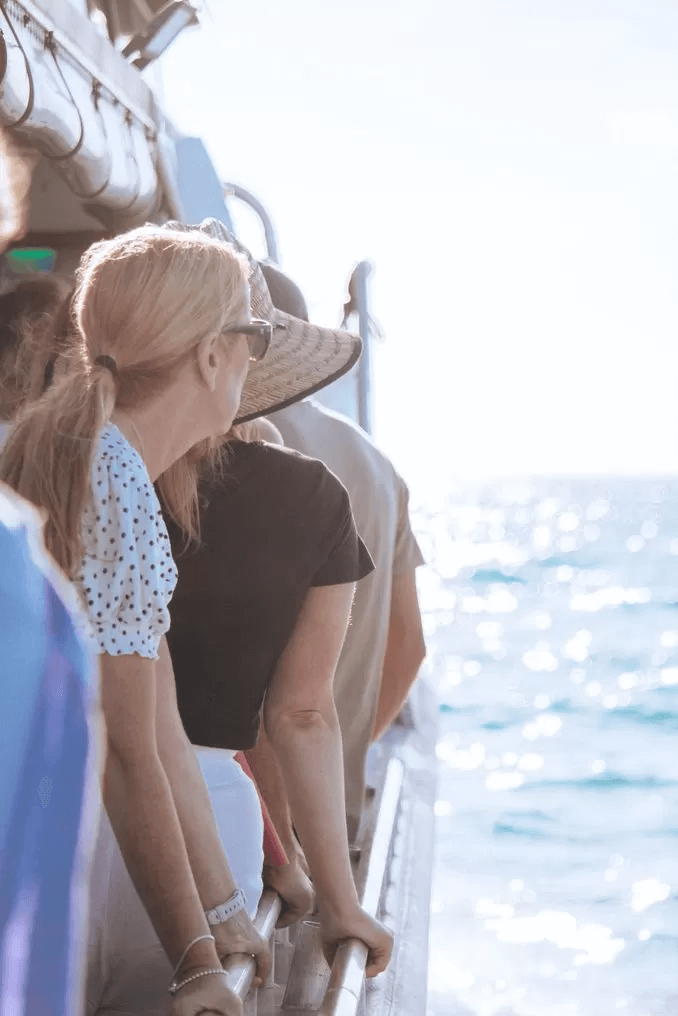 People looking at the ocean on Broome fishing charter